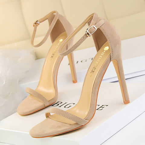 High-heeled suede open-toe pumps